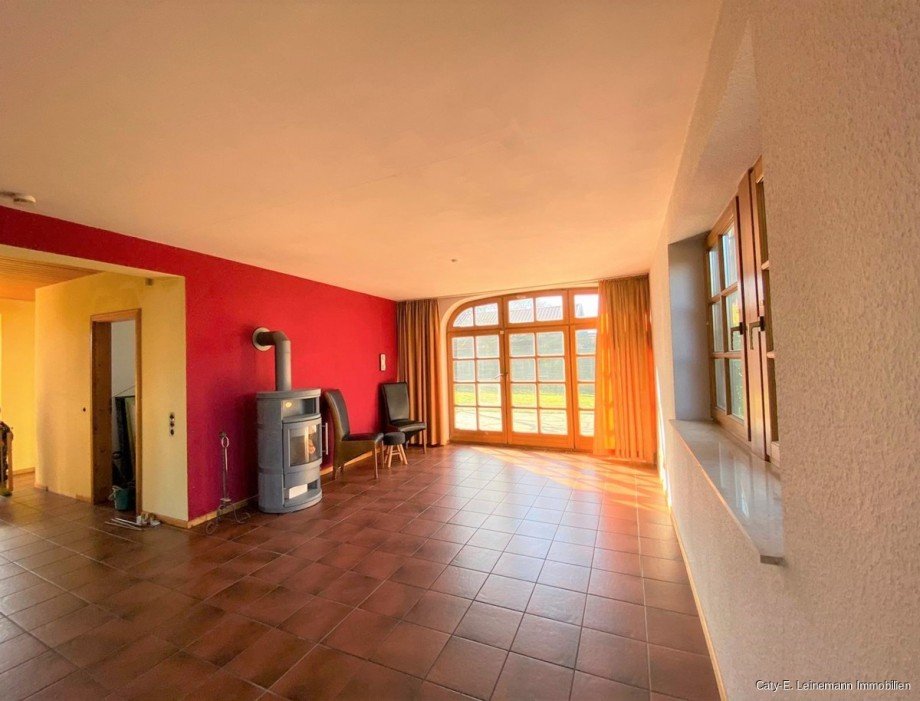 EG Wohnzimmer mit Blick zur Terrasse Einfamilienhaus Burgwedel / Engensen